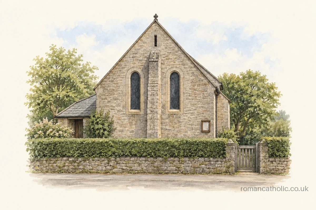 Small stone chapel with two tall windows divided by a central buttress behind a hedge.